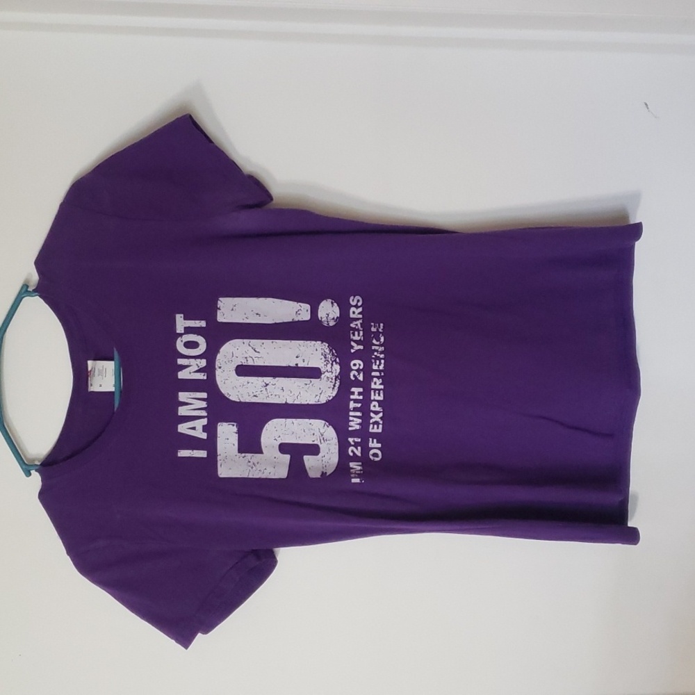 I'm not 50! I'm 21 with 29 years experience.  Purple Tshirt